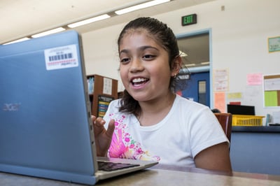 student in school smiling